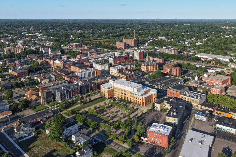Aerial view of downtown Brockton, Massachusetts, with City Hall and tree-lined neighborhoods